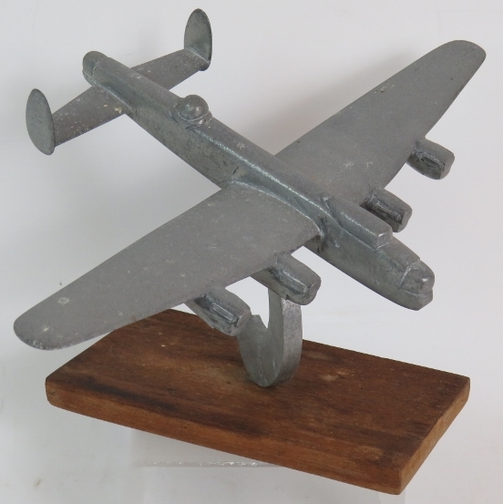 A WW2 trench art Lancaster Bomber cast in aluminium, wingspan 31cm, - Image 4 of 8