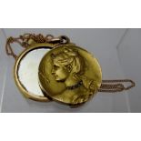 An Art Nouveau yellow metal locket, believed to be 18ct gold,
