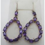 Zambian amethyst earrings, 57mm x 23mm, shepherds hook, weight approx 7.03 grams, 10.50cts.