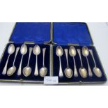 A set of twelve silver teaspoons in two boxes, Birmingham 1911, approx 166 grams/5.33 troy ounces.