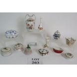 A small collection of decorative continental porcelain boxes, vases and pin dishes,