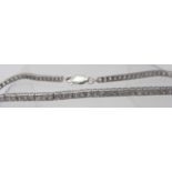 A white stone bracelet with 9ct white gold lobster clasp.