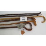 A collection of five country made walking sticks including a 4' 6" Shepherds crook,
