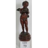 A good quality bronze figure of a cherub or putto entitled 'Presents D'amour Prix De Rome' by