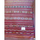 A large 20's Moroccan Kelim carpet, 360cm x 143cm approx.