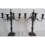 A fabulous pair of ornate four branch candelabra in silver plated copper.