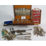 A large quantity of antique and vintage cutlery including a boxed canteen,