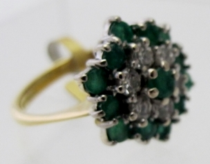 An 18ct gold diamond and emerald cluster ring, diamonds approx 0.6cts, and emeralds 1.15cts, size M. - Image 2 of 2