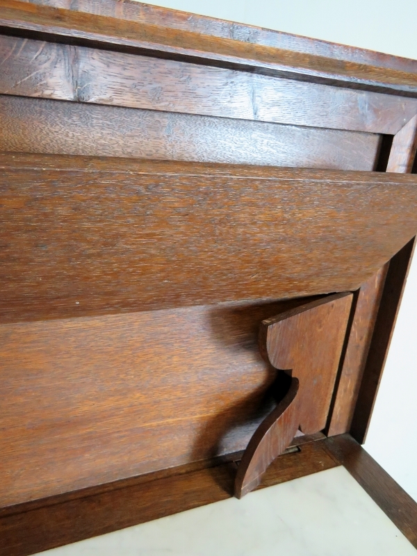 A Victorian carved oak buffet table with a lift up top revealing a white marble inset top and - Image 4 of 10