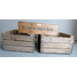 Three vintage produce crates to include two matching and one stamped 'Unwins quality