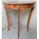 A small 20th Century walnut demi lune console side table with gilt ormolu mounts.