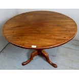 19th Century pale mahogany tilt top tripod table.