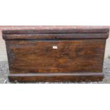 A Victorian stained pine trunk with a lift up lid revealing an internal candle box with two small