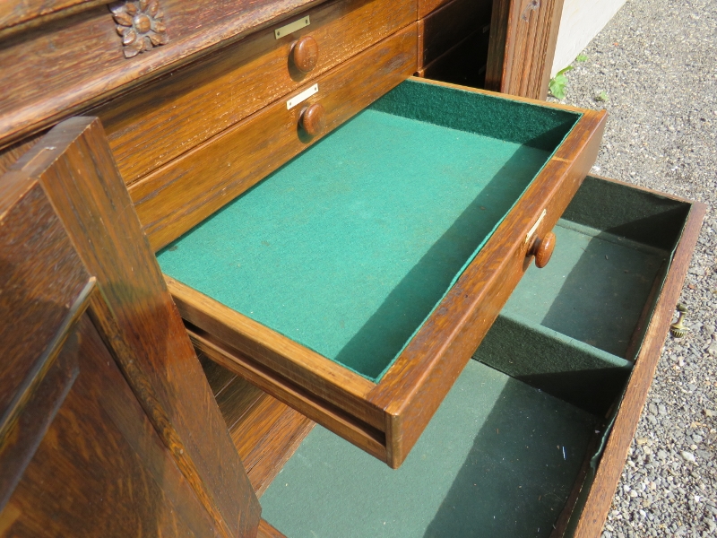 A period-style oak collectors cabinet with linen fold panelled doors opening to reveal an - Image 4 of 5