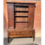 A fine 18th Century country oak high back dresser with a central plate rack to top flanked either