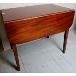 A 19th century mahogany drop leaf Pembroke table with a single drawer to one end having brass