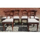 A set of six early Victorian mahogany framed dining chairs upholstered in a grey tweed fabric over