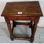 A late 17th/early 18th century oak joint stool, with thumb carved design to frieze,