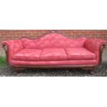 A fine Empire-revival show wood framed sofa with decorative swan neck arm supports and upholstered