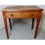 A 19th Century oak side table with a single frieze drawer over tapering legs.