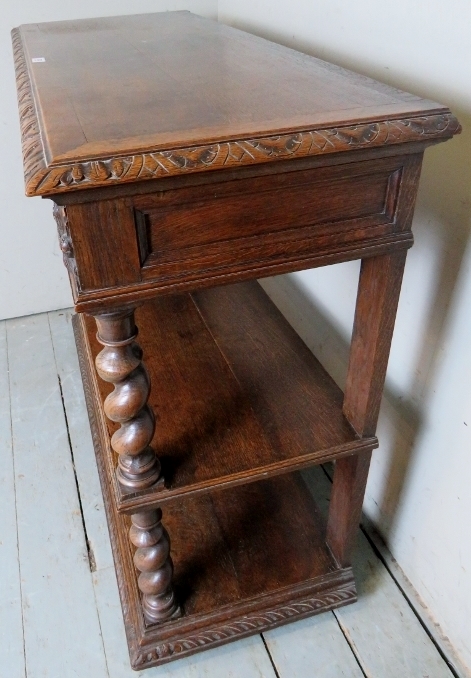 A Victorian carved oak buffet table with a lift up top revealing a white marble inset top and - Image 8 of 10