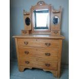 A 19th century pine dressing table with a central mirror to top flanked either side by small
