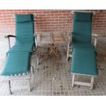 A pair of good quality folding steamer garden chairs complete with loose fitted seat cushions.