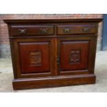 An Edwardian oak chiffonier sideboard with two small drawers to top over double panelled Art