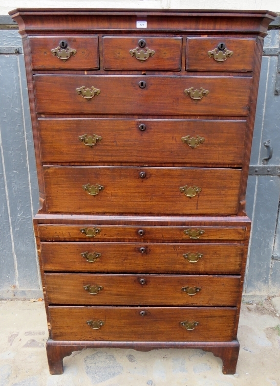 A good quality Georgian mahogany chest on chest with an assortment of three small drawers over