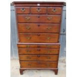 A good quality Georgian mahogany chest on chest with an assortment of three small drawers over