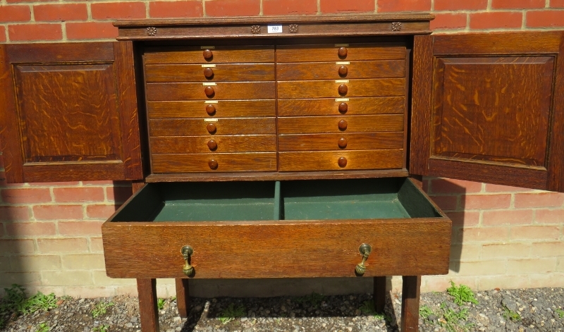 A period-style oak collectors cabinet with linen fold panelled doors opening to reveal an - Image 2 of 5