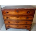 A fine 19th Century inlaid serpentine chest of four long drawers with turned handles and decorative