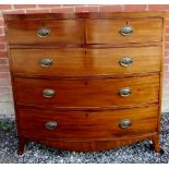 A 19th Century bow front mahogany chest of two short over three long drawers with brass handles