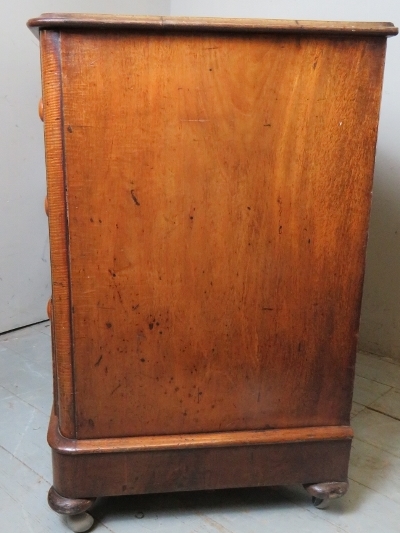 A Victorian mahogany low chest of two short over two long flame mahogany drawers with bun handles - Image 2 of 3