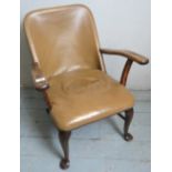 A C1900 tan leather elbow chair in good sound condition,