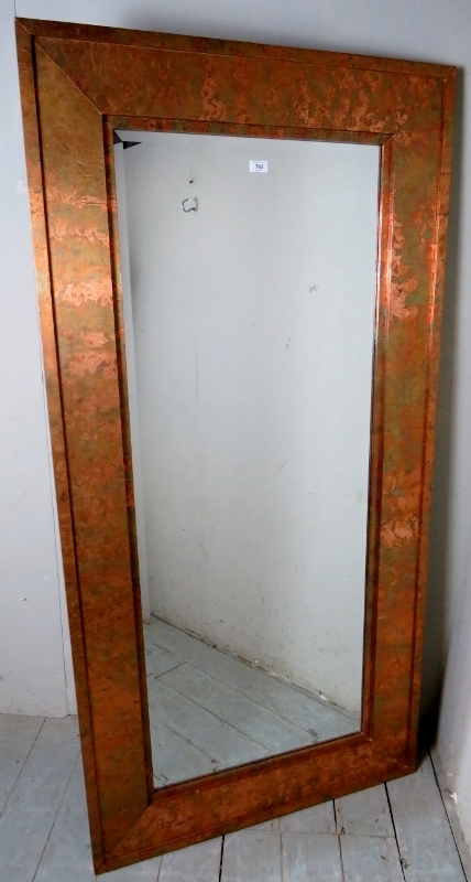 A large rectangular contemporary copper effect wall mirror Condition report: Overall condition is