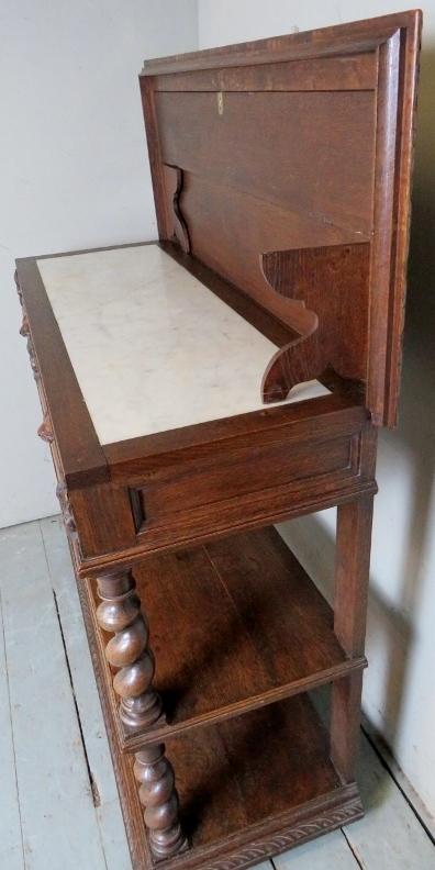 A Victorian carved oak buffet table with a lift up top revealing a white marble inset top and - Image 9 of 10