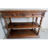 A Victorian carved oak buffet table with a lift up top revealing a white marble inset top and