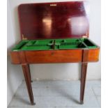 A late 19th century mahogany cutlery table with a lift up top revealing internal fittedlined