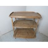A mid-century Ercol three tier buffet drinks trolley. Condition report: good condition, no damage.