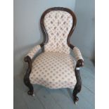 A pretty Victorian walnut framed spoon back nursing chair upholstered in a fine quality 'Coalfax &