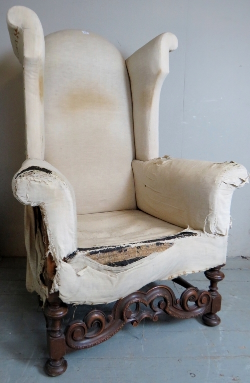 A fine quality 19th century high-back wing armchair in a late 17th Century-revival taste,