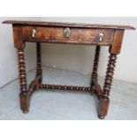 A good quality Bylaws replica 17th Century style side table with a single frieze drawer having