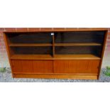 A mid - late 20th Century teak narrow fr