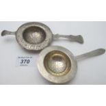 A silver tea strainer marked silver, and