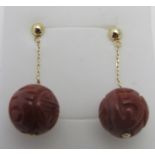14k yellow gold carved jade earrings, 32