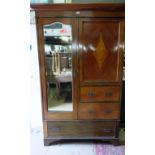 An Edwardian inlaid mahogany double ward