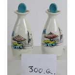A pair of Midwinter 'Style Craft' fashion-shape oil and vinegar bottles,