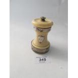 An ivory silver mounted pepper mill, London 1883. Ivory split and corrosion on the silver.