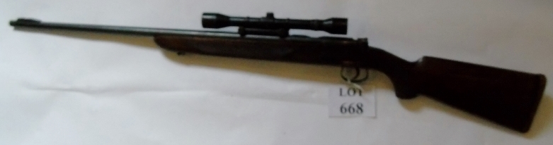 A Mauser-Werke -22 long rifle with telescopic sight and a Rosewood stock S/No 163494. Section 1.